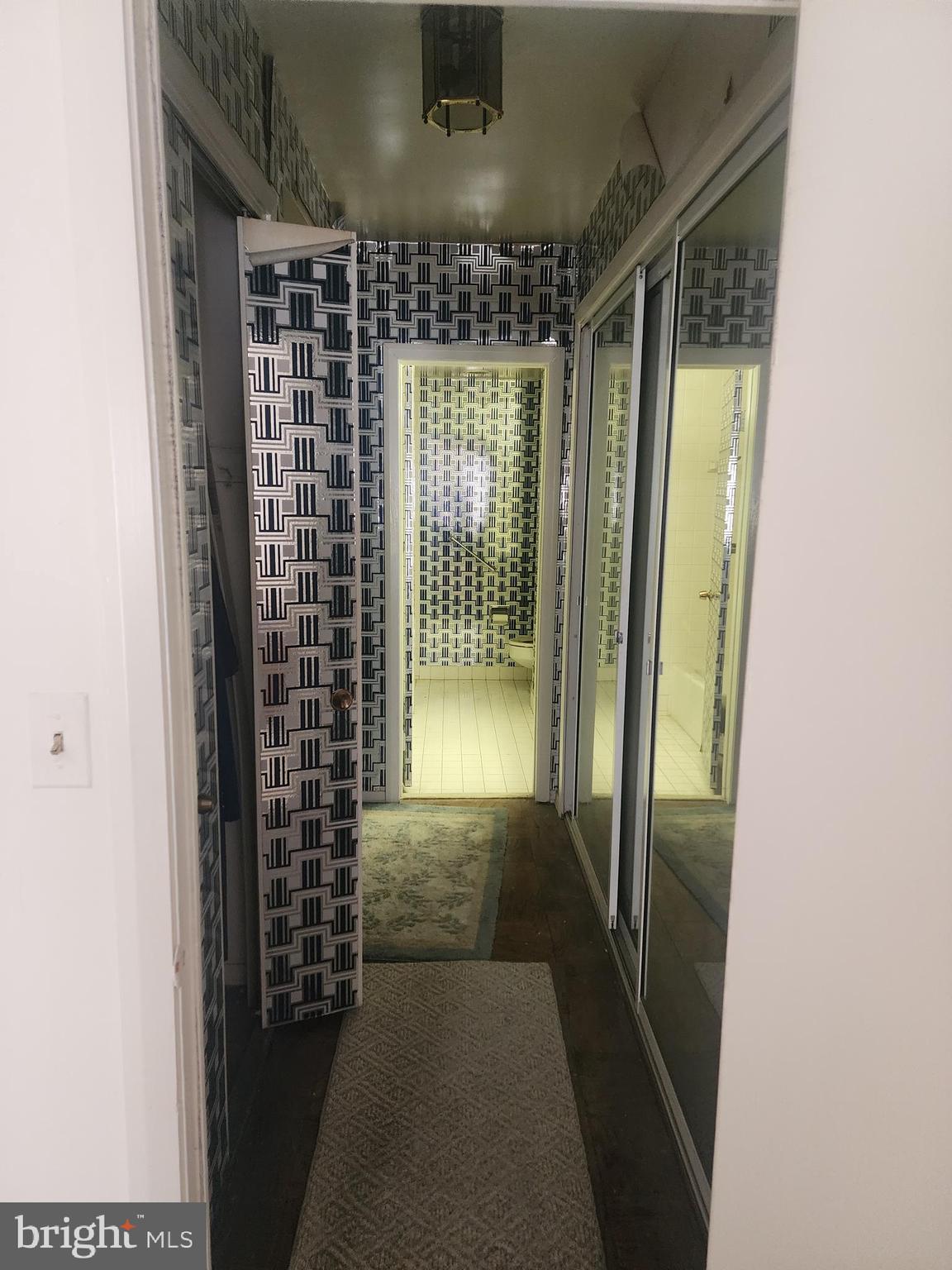 3601 Clarks Lane, Unit 416 Baltimore, MD 21215 - Photo 42 of 68 a view of hallway with windows