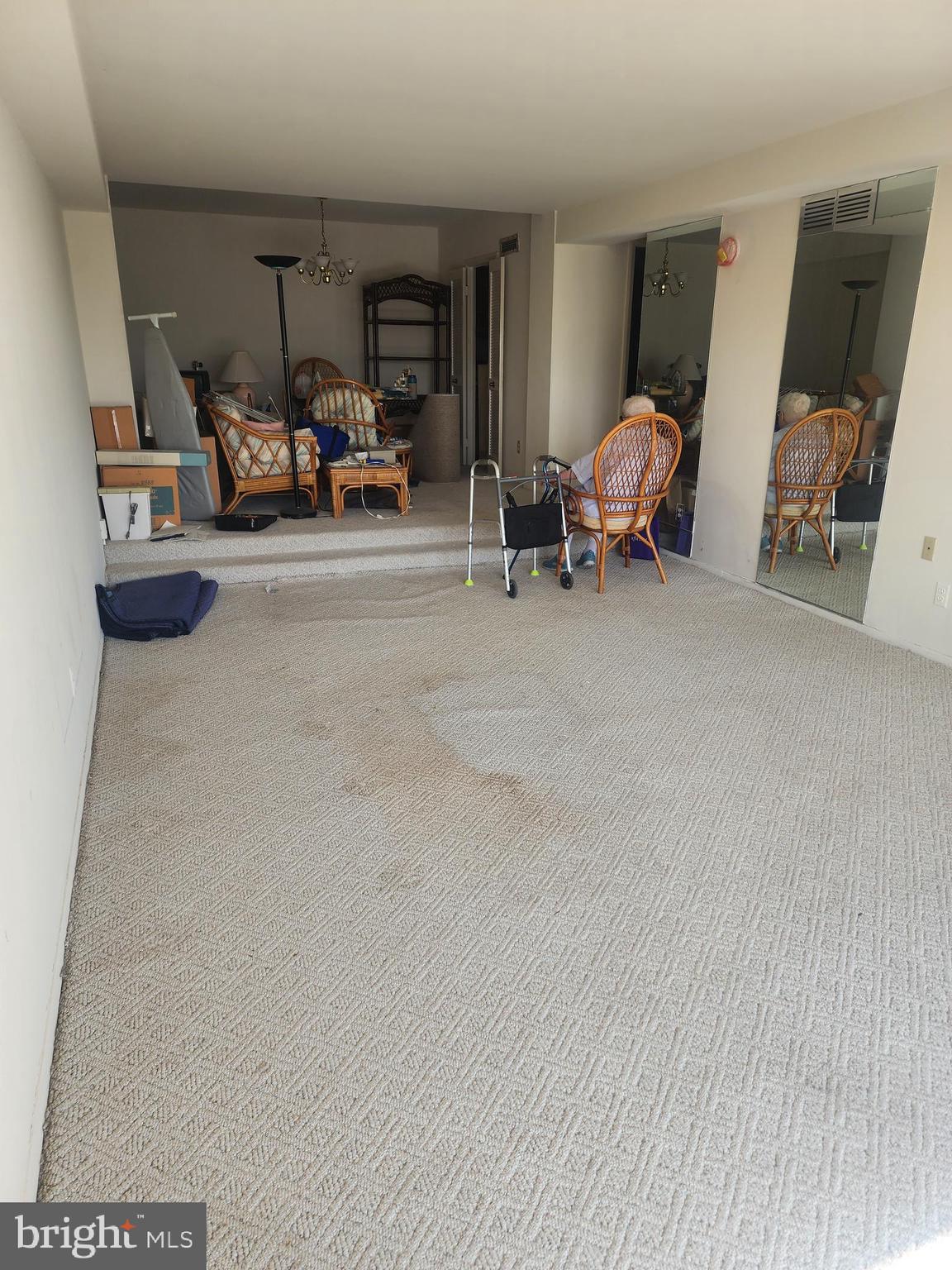 3601 Clarks Lane, Unit 416 Baltimore, MD 21215 - Photo 5 of 68 a view of a room with furniture and a window