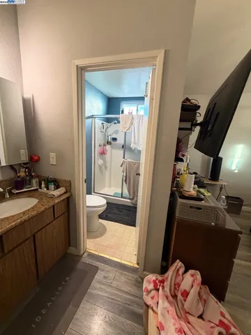 a kitchen with a stove and a microwave