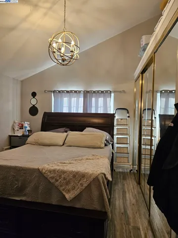 a bathroom with a double vanity sink toilet and shower