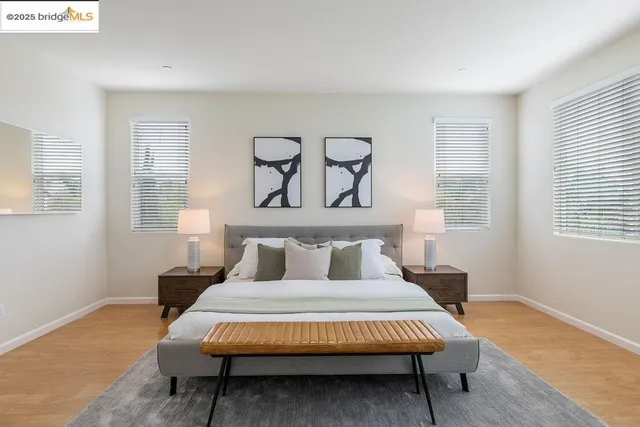 a bathroom with a sink a tub and a mirror