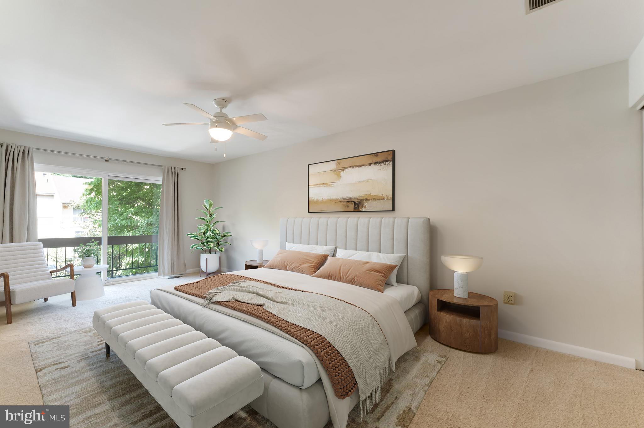 11637 Newbridge Court Reston, VA 20191 - Photo 20 of 63 a bedroom with a large bed and a large window