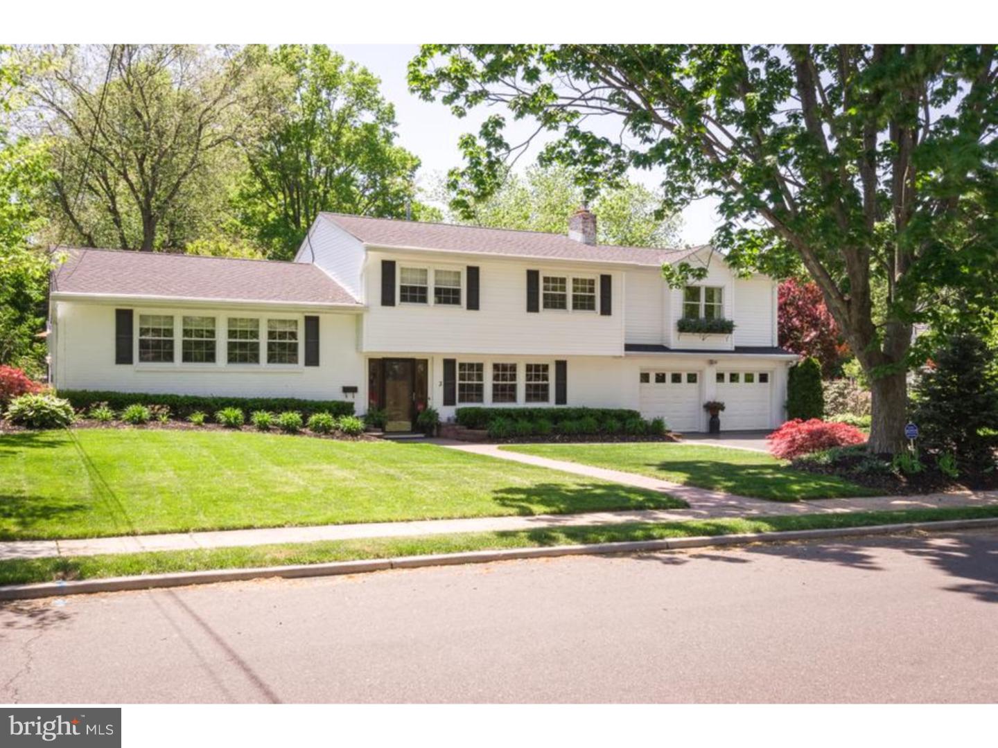 3 Griggs Road Cranbury, NJ 08512 - Photo 1 of 25 a front view of a house with a garden and yard