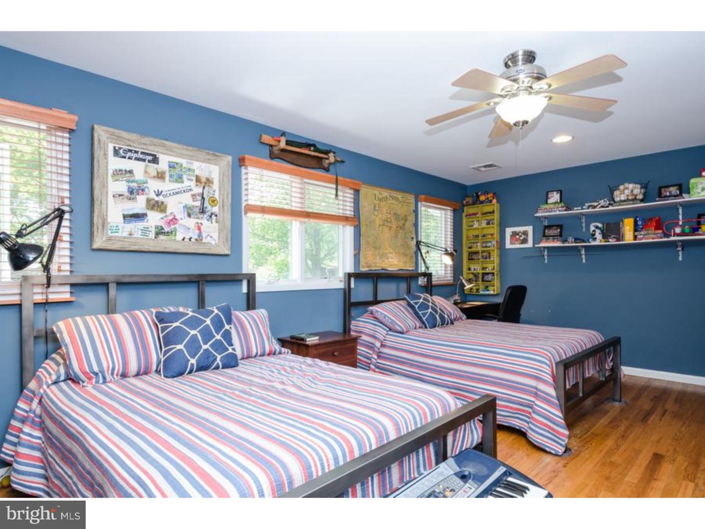 3 Griggs Road Cranbury, NJ 08512 - Photo 15 of 25 a bedroom with two beds and a large window