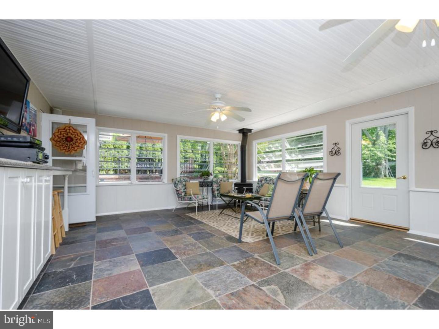 3 Griggs Road Cranbury, NJ 08512 - Photo 20 of 25 a living room with furniture and a window