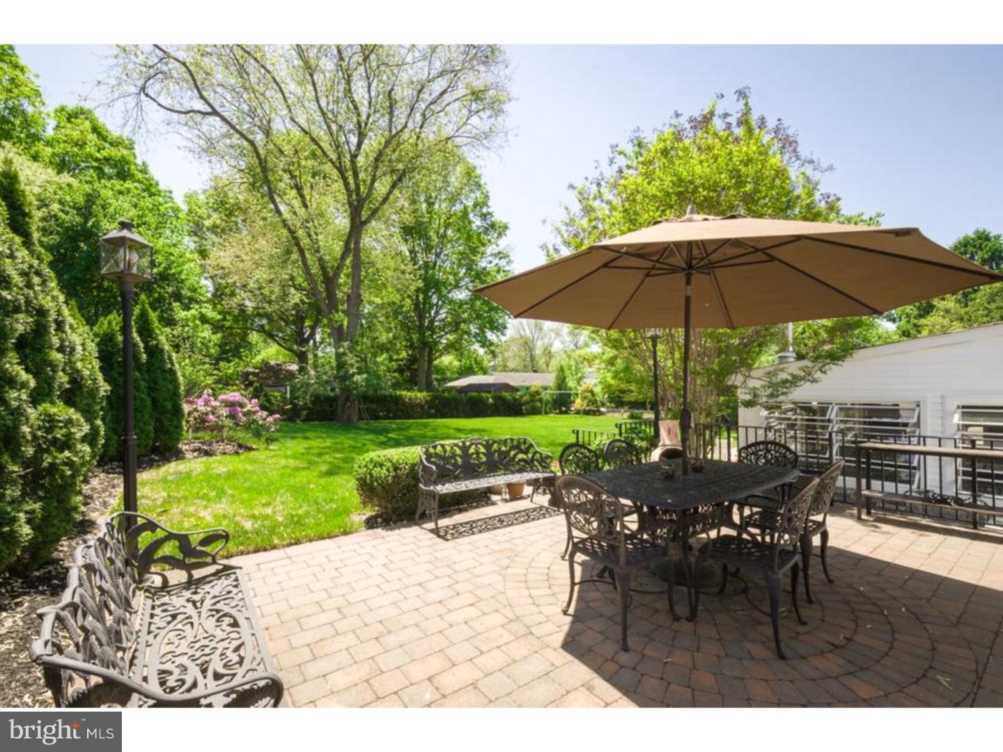 3 Griggs Road Cranbury, NJ 08512 - Photo 21 of 25 a view of backyard with outdoor seating and trees