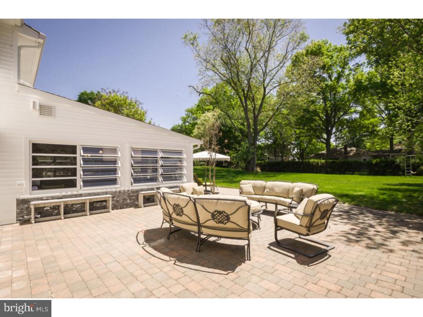 3 Griggs Road Cranbury, NJ 08512 - Photo 23 of 25 a house view with a seating space and garden