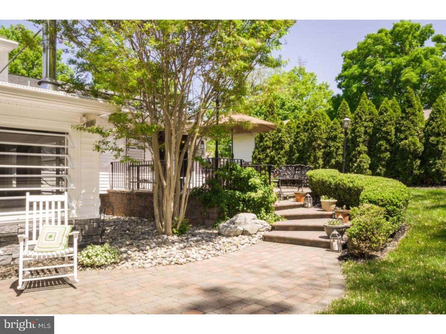 3 Griggs Road Cranbury, NJ 08512 - Photo 25 of 25 a view of a patio with table and chairs and potted plants