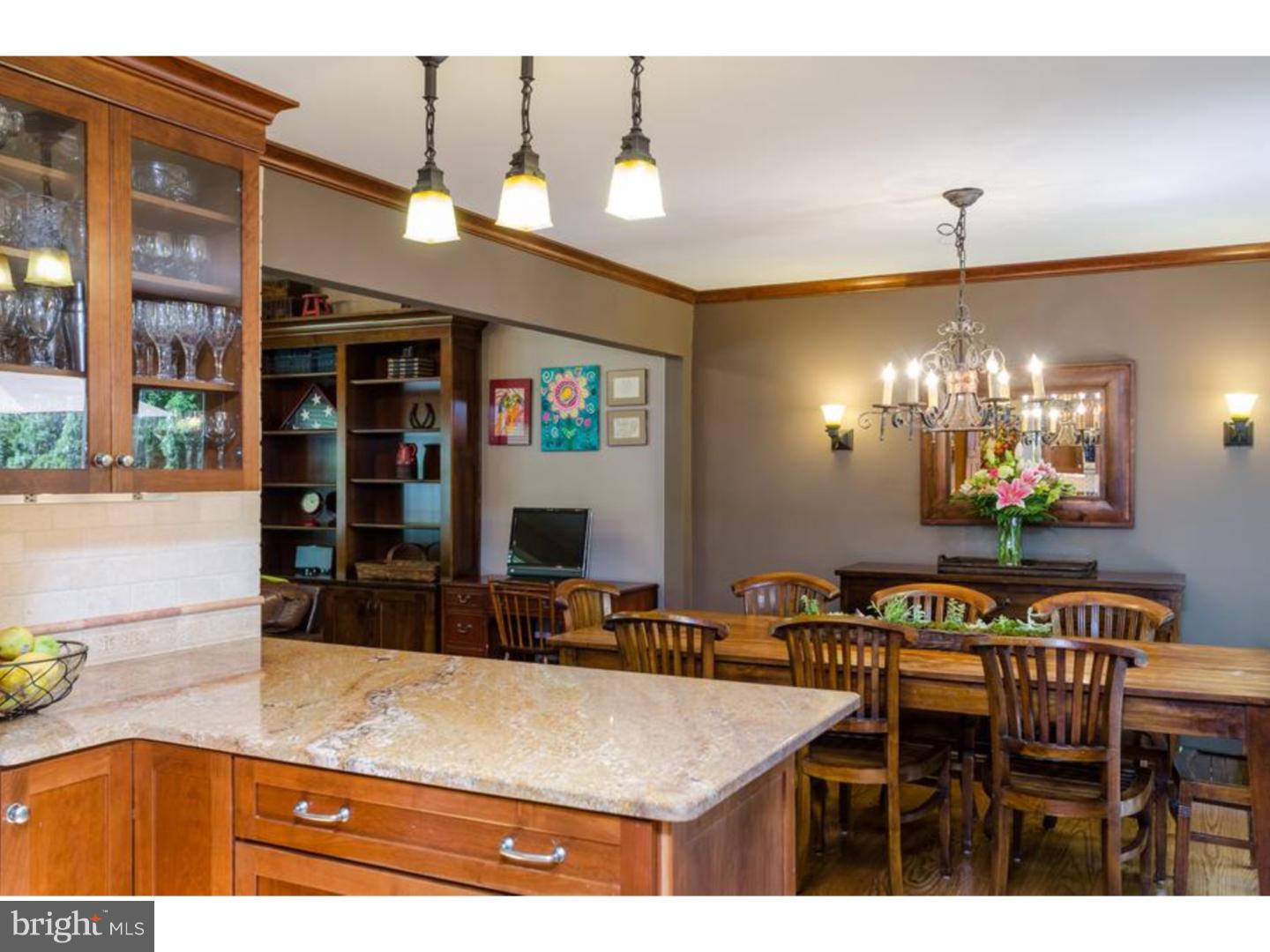 3 Griggs Road Cranbury, NJ 08512 - Photo 4 of 25 a view of a dining room with furniture and chandelier