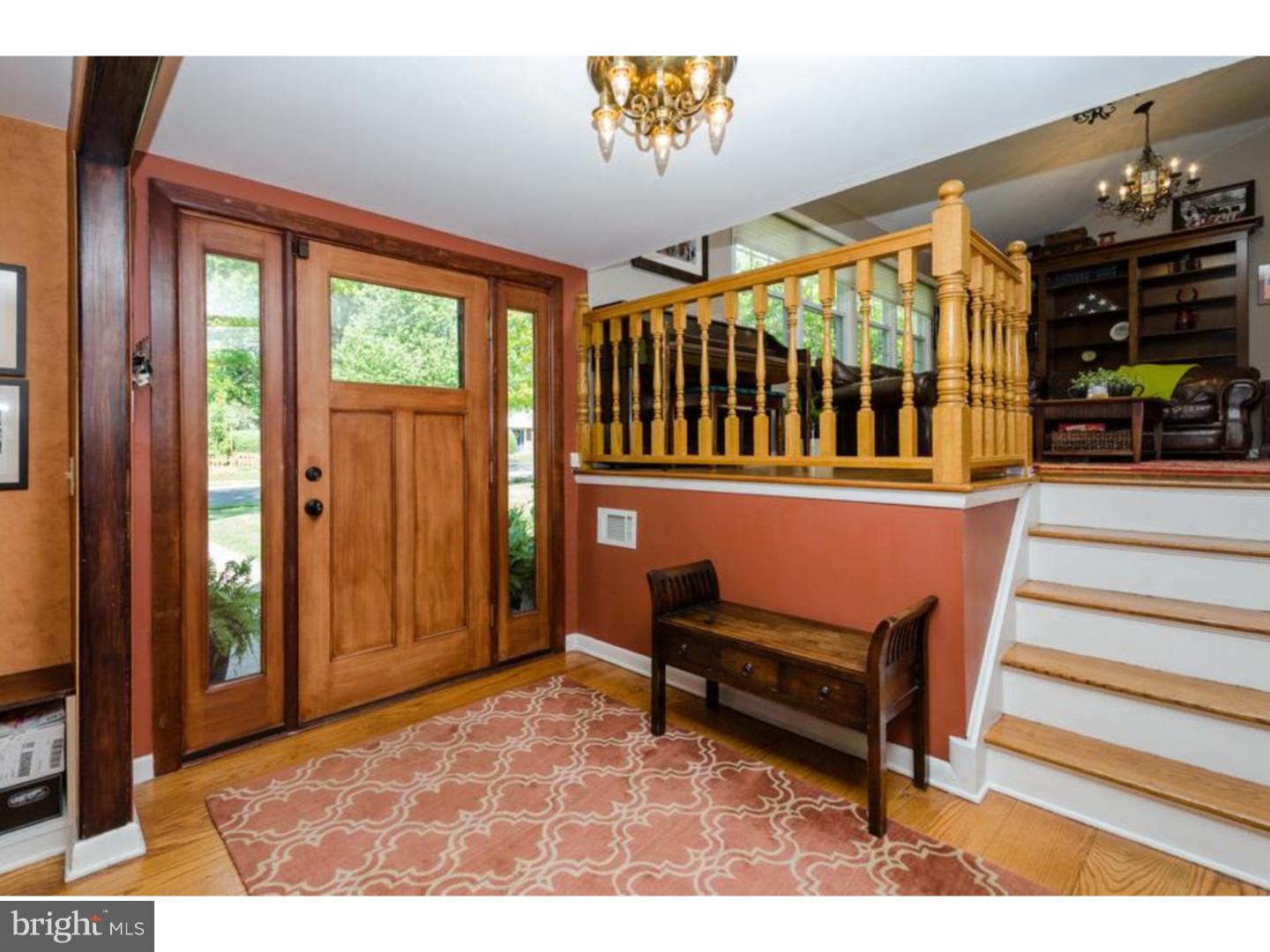 3 Griggs Road Cranbury, NJ 08512 - Photo 8 of 25 a view of a porch with a bench