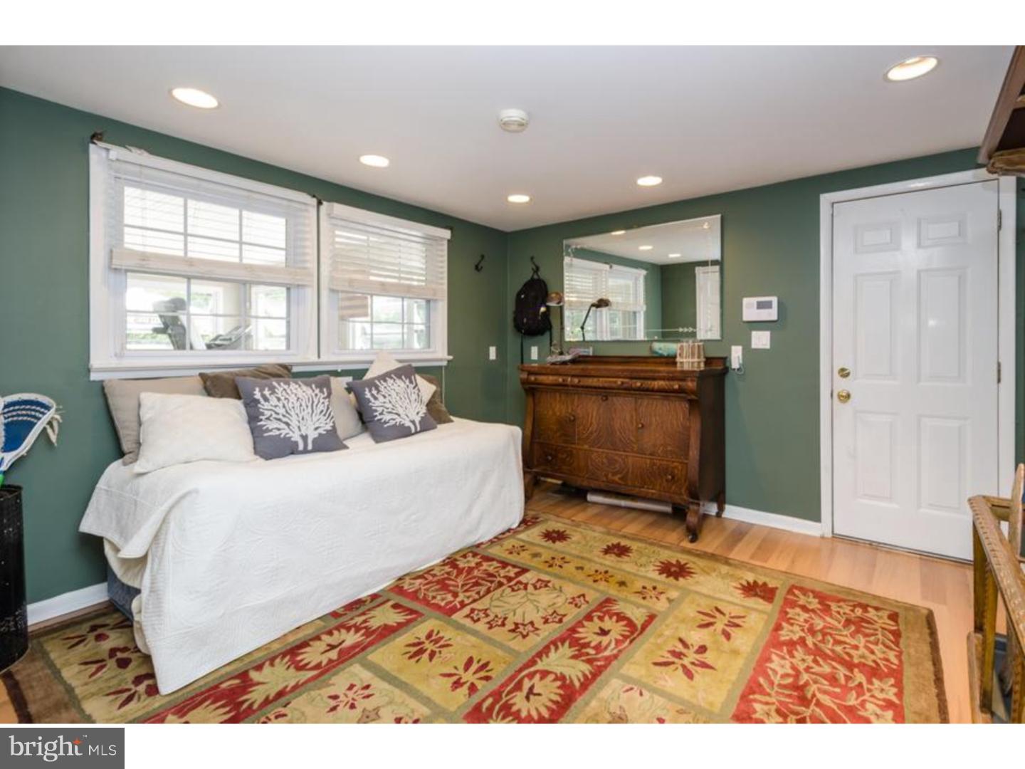3 Griggs Road Cranbury, NJ 08512 - Photo 9 of 25 a bedroom with a bed and a large window