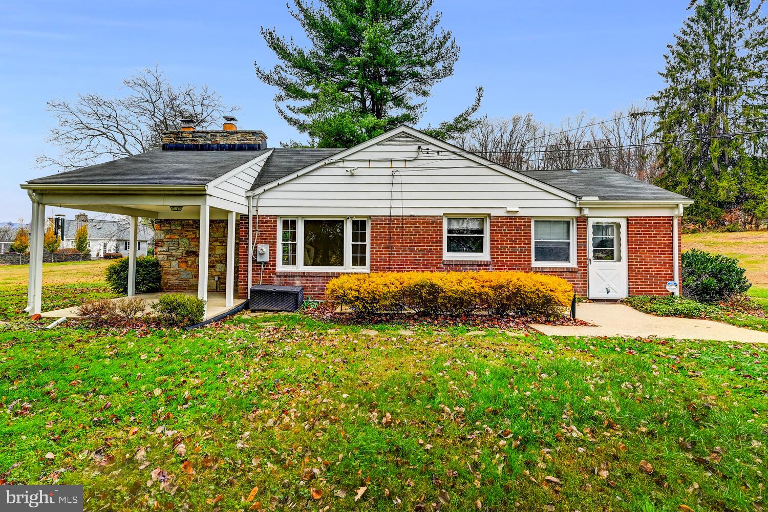 3925 Dance Mill Road Phoenix, MD 21131 - Photo 19 of 26 a front view of a house with a yard