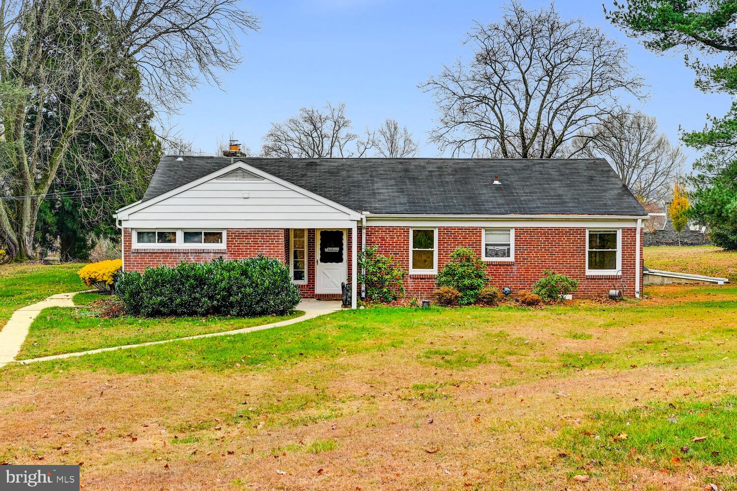 3925 Dance Mill Road Phoenix, MD 21131 - Photo 25 of 26 a front view of a house with a yard