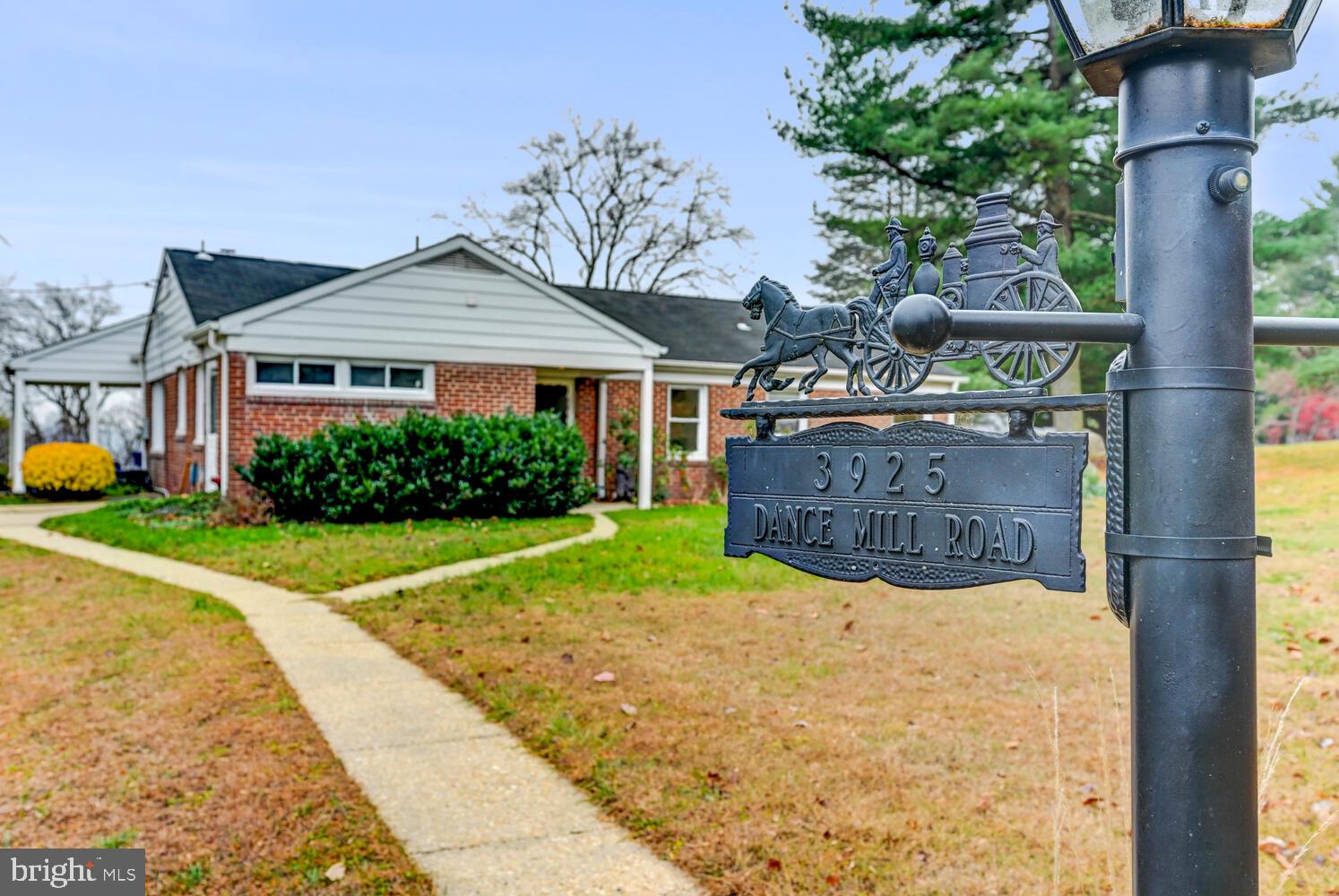 3925 Dance Mill Road Phoenix, MD 21131 - Photo 26 of 26 a view of a house with a small yard and large tree