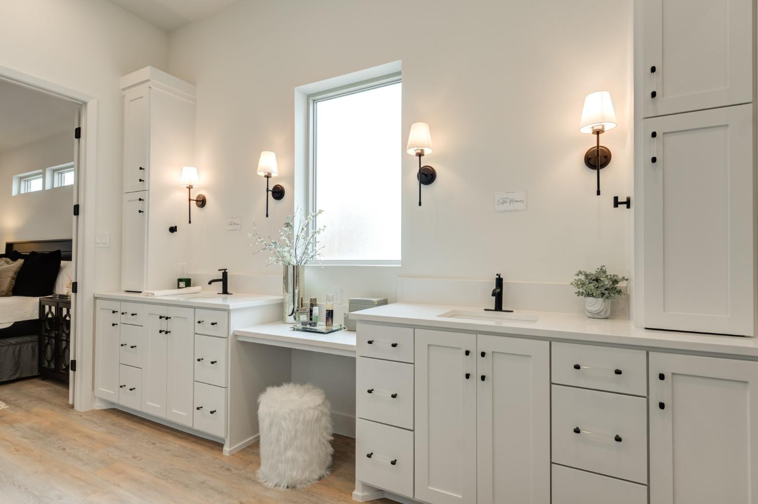 3803 127th Street Lubbock, TX 79423 - Photo 24 of 44 a bathroom with a double vanity sink and mirror