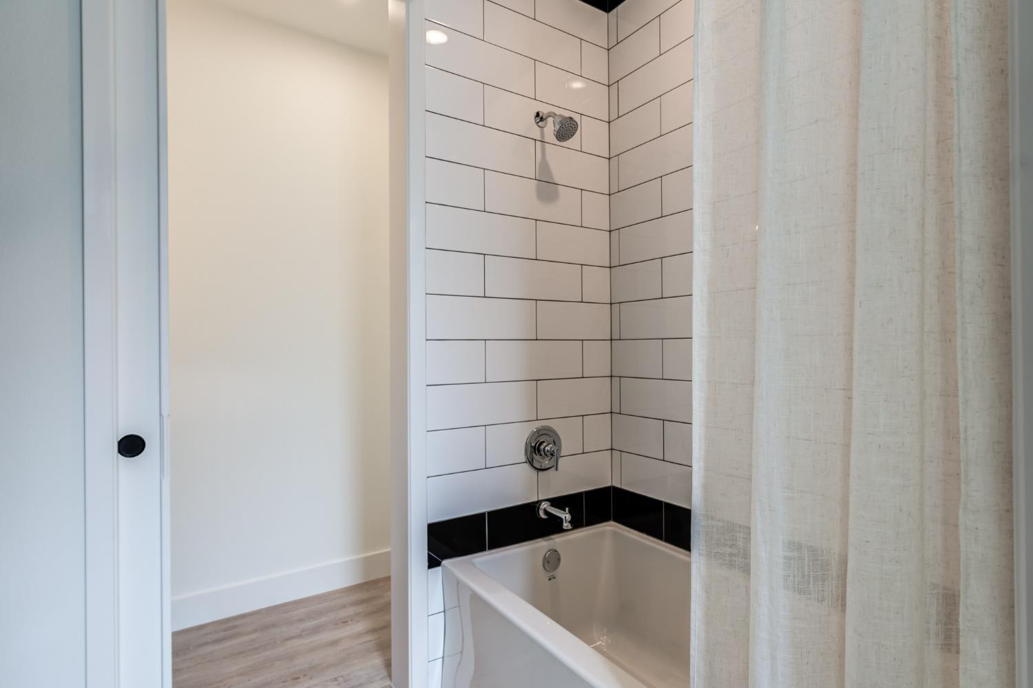 3803 127th Street Lubbock, TX 79423 - Photo 29 of 44 a bathroom with a bathtub