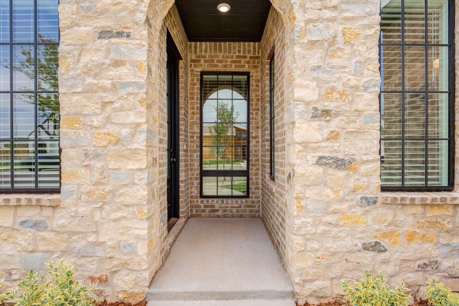 3803 127th Street Lubbock, TX 79423 - Photo 3 of 44 a view of entrance door of the house