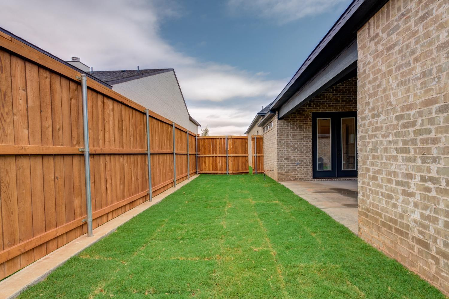 3803 127th Street Lubbock, TX 79423 - Photo 41 of 44 a view of backyard with wooden fence