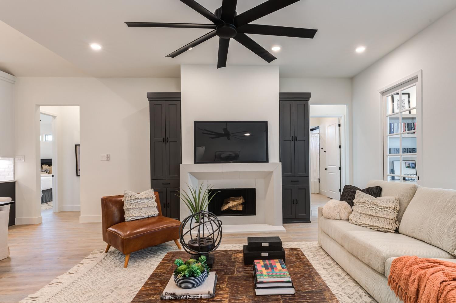 3803 127th Street Lubbock, TX 79423 - Photo 6 of 44 a living room with furniture and a fireplace