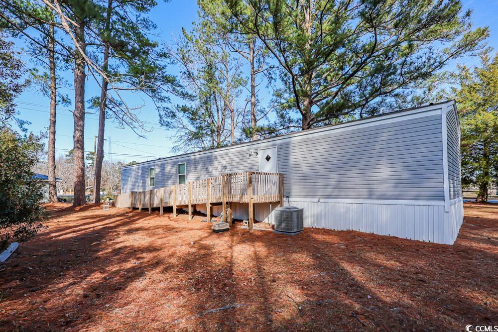 255 Quail Run Road Loris, SC 29569 - Photo 21 of 29 Back of house featuring a wooden deck