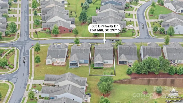 a view of multi story residential apartment building with outdoor space