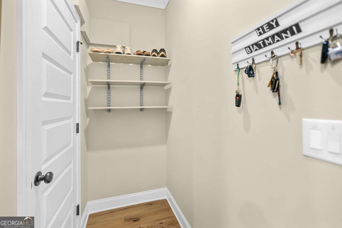 294 Conner Lane Williamson, GA 30292 - Photo 29 of 62 a view of walk in closet with empty racks
