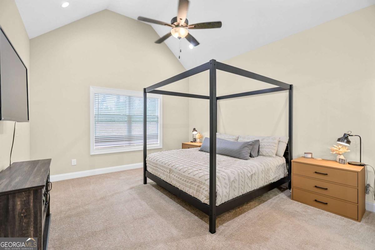 294 Conner Lane Williamson, GA 30292 - Photo 31 of 62 a bedroom with a bed and a window