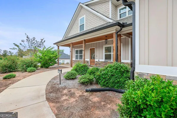 front view of a house with a yard