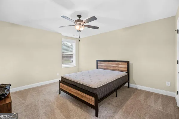an aerial view of a house with a garden