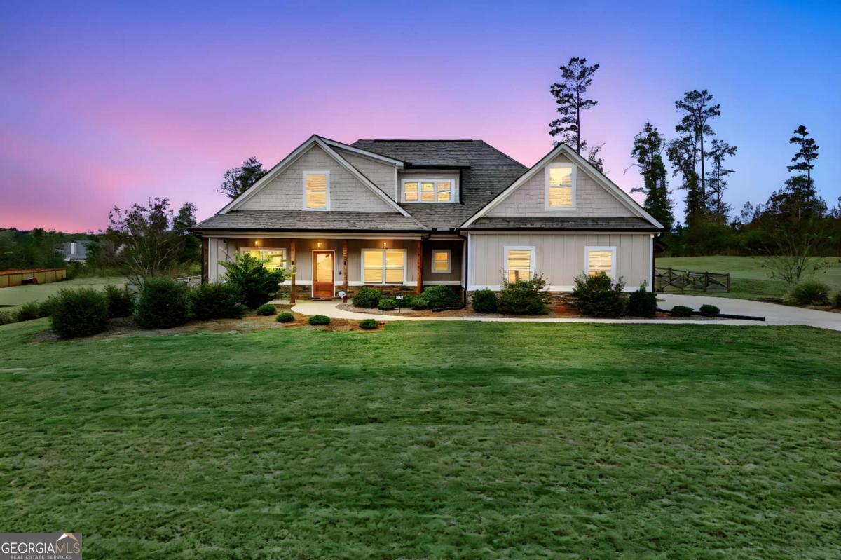 294 Conner Lane Williamson, GA 30292 - Photo 61 of 62 a front view of a house with garden