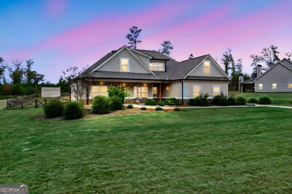 294 Conner Lane Williamson, GA 30292 - Photo 62 of 62 a front view of a house with a yard