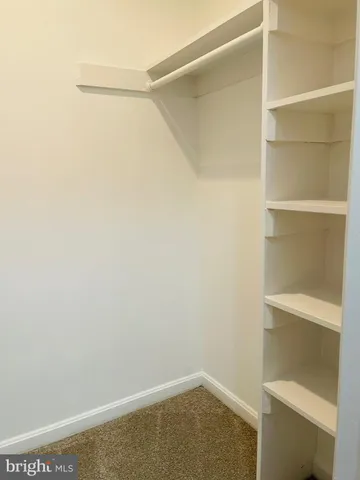 a bathroom with a toilet a sink and bathtub