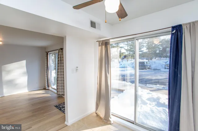 a view of entryway with wooden floor