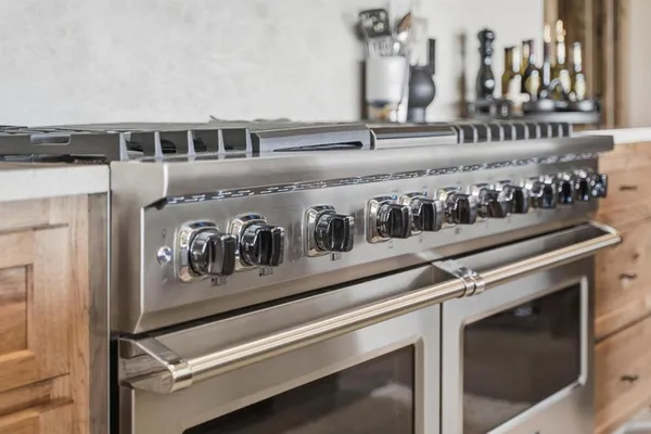 a close view of a stove with kitchen
