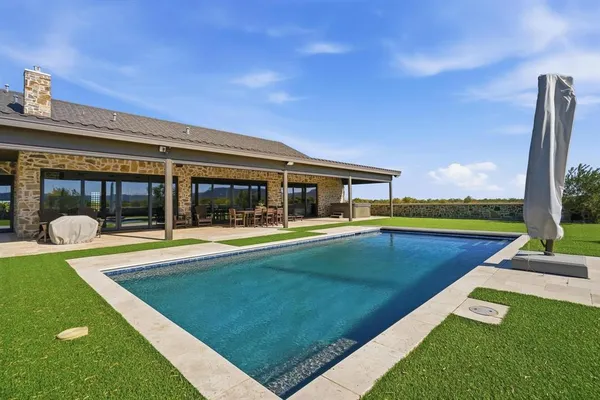 a view of swimming pool with outdoor space