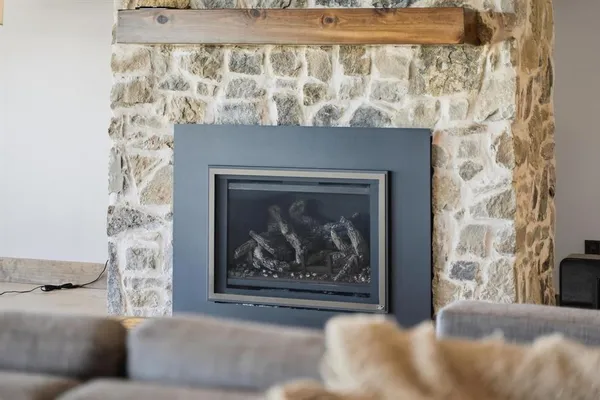 a living room with a fireplace