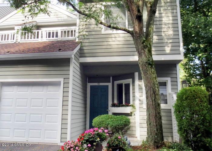 333 Palmer Hill Road, Unit 1D Riverside, CT 06878 - Photo 1 of 12 a front view of a house with plants