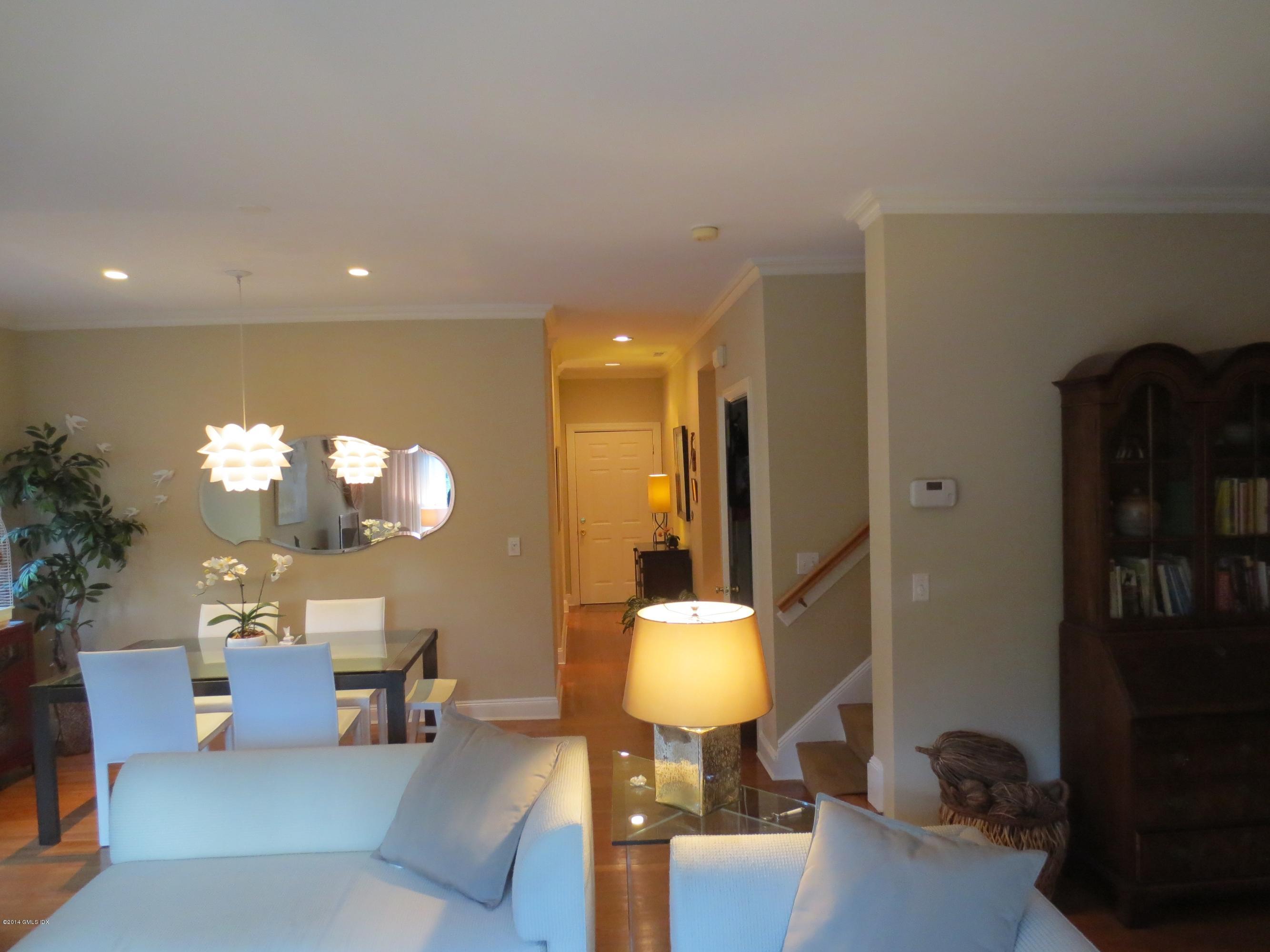 333 Palmer Hill Road, Unit 1D Riverside, CT 06878 - Photo 4 of 12 a view of a livingroom and dining room