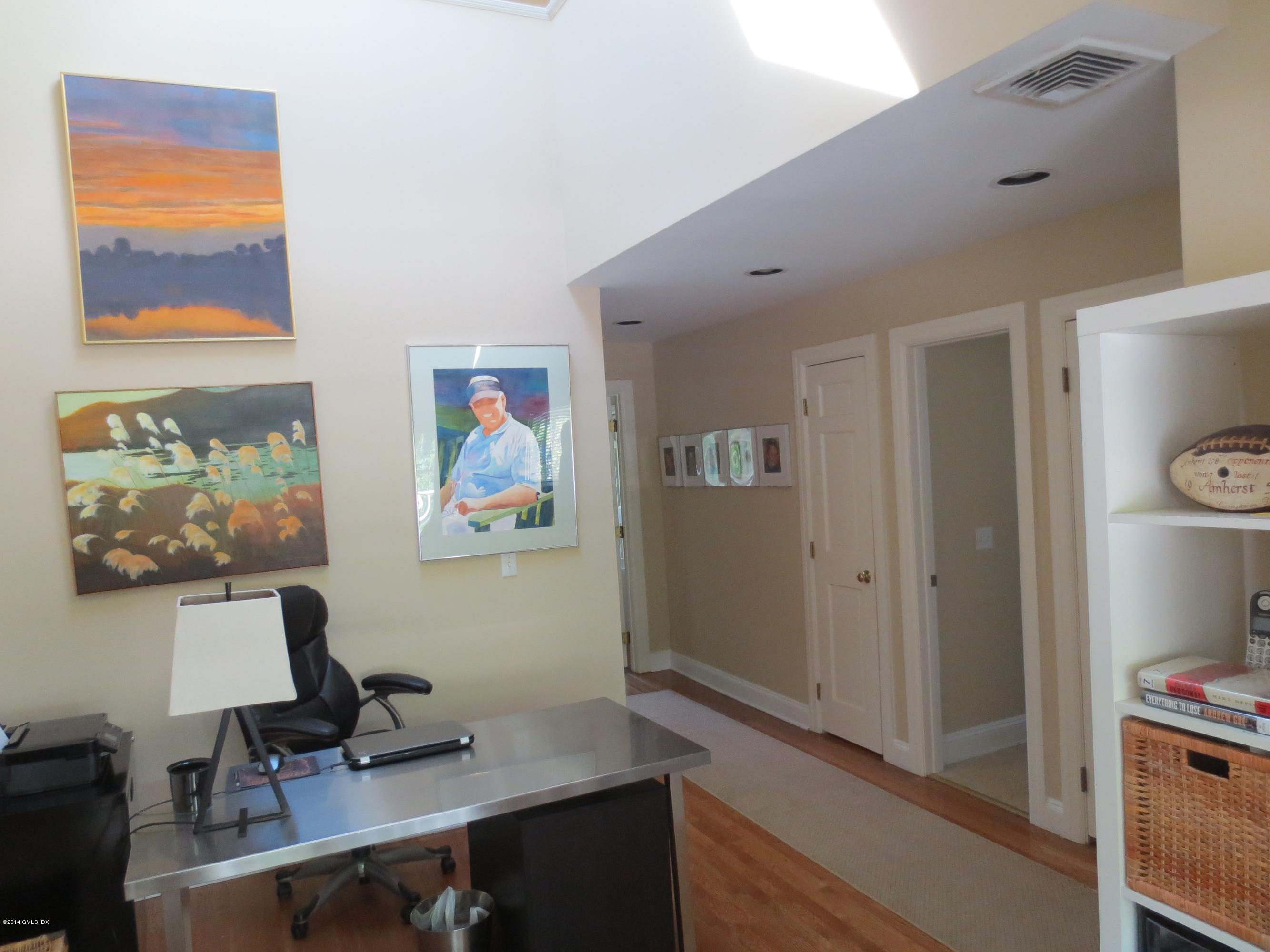333 Palmer Hill Road, Unit 1D Riverside, CT 06878 - Photo 9 of 12 a view of a workspace with furniture and a window