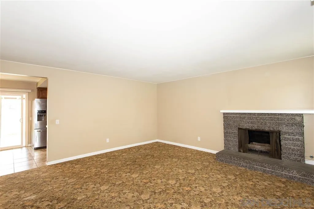 5939 Normandie Place Riverside, CA 92506 - Photo 6 of 21 a view of empty room with wooden floor
