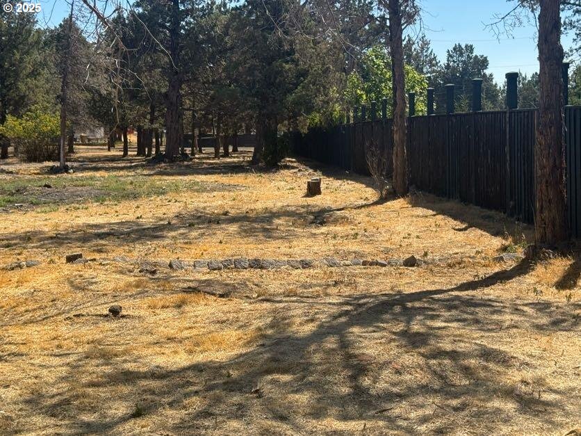 12292 Southwest Lords Place Terrebonne, OR 97760 - Photo 11 of 20 a view of yard with wooden fence