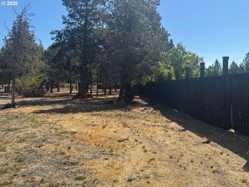 12292 Southwest Lords Place Terrebonne, OR 97760 - Photo 14 of 20 a backyard of a house with lots of green space