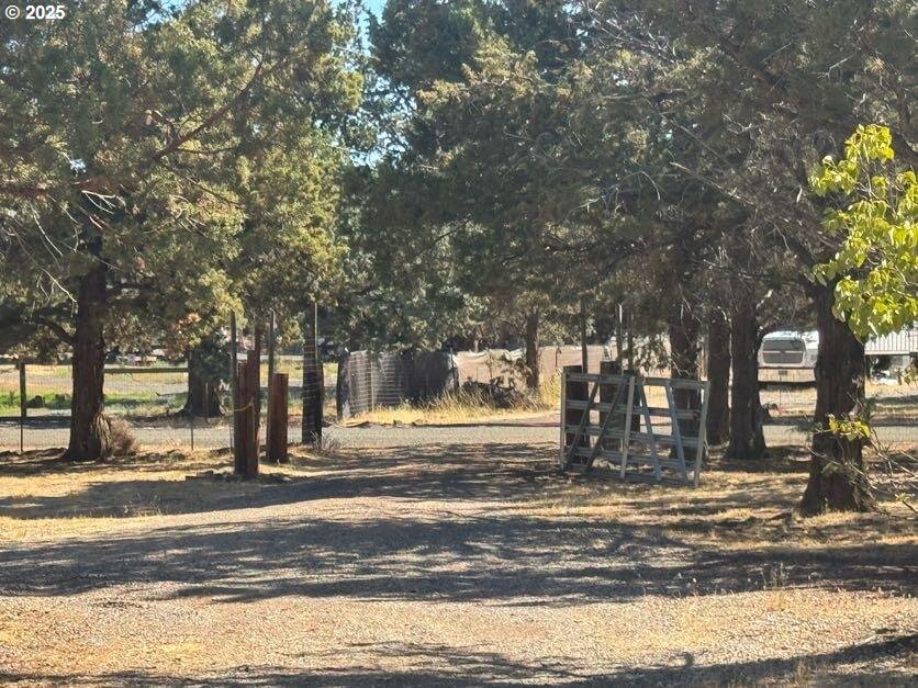 12292 Southwest Lords Place Terrebonne, OR 97760 - Photo 15 of 20 a view of street with trees