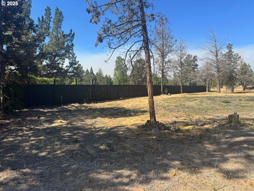 12292 Southwest Lords Place Terrebonne, OR 97760 - Photo 19 of 20 a view of a yard with a tree