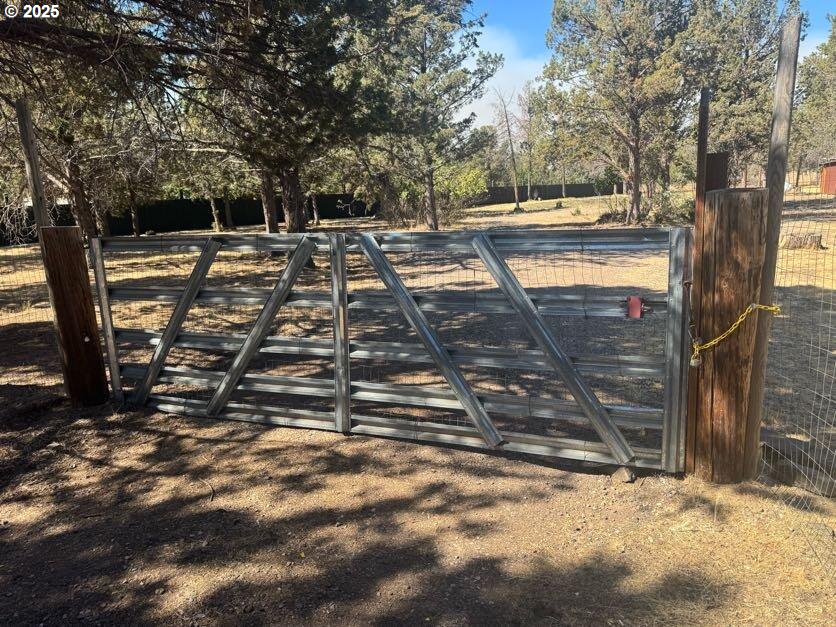 12292 Southwest Lords Place Terrebonne, OR 97760 - Photo 2 of 20 a view of a yard with an trees