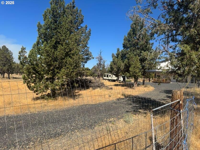 12292 Southwest Lords Place Terrebonne, OR 97760 - Photo 10 of 20 a view of outdoor space with trees