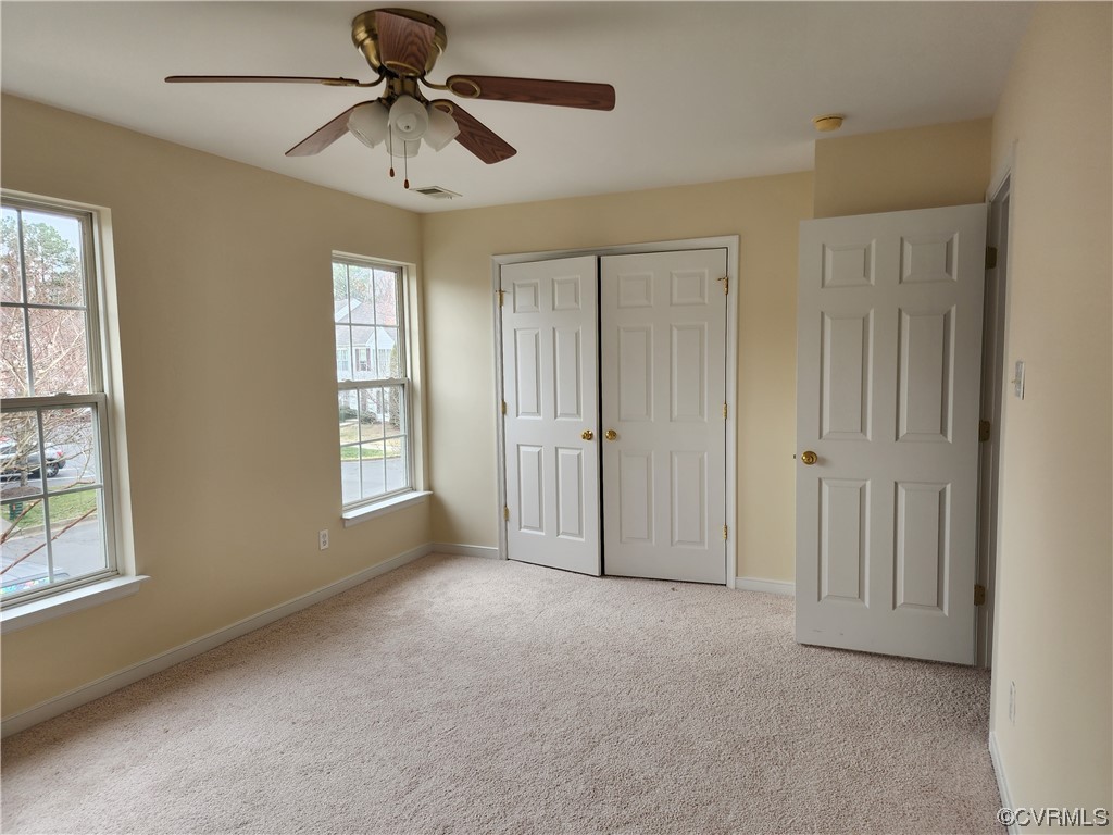 8657 Millstream Drive Henrico, VA 23228 - Photo 14 of 19 a view of empty room with window and chandelier fan