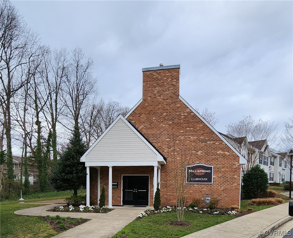8657 Millstream Drive Henrico, VA 23228 - Photo 19 of 19 a front view of a house with garden