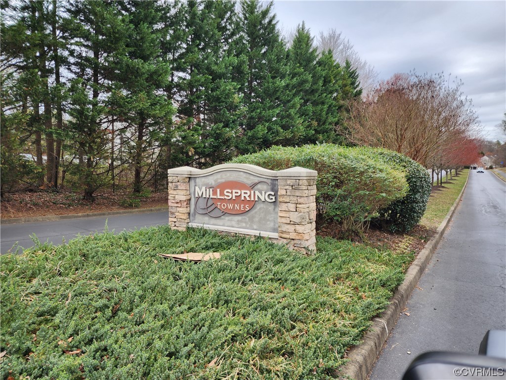 8657 Millstream Drive Henrico, VA 23228 - Photo 2 of 19 a sign board with tall trees