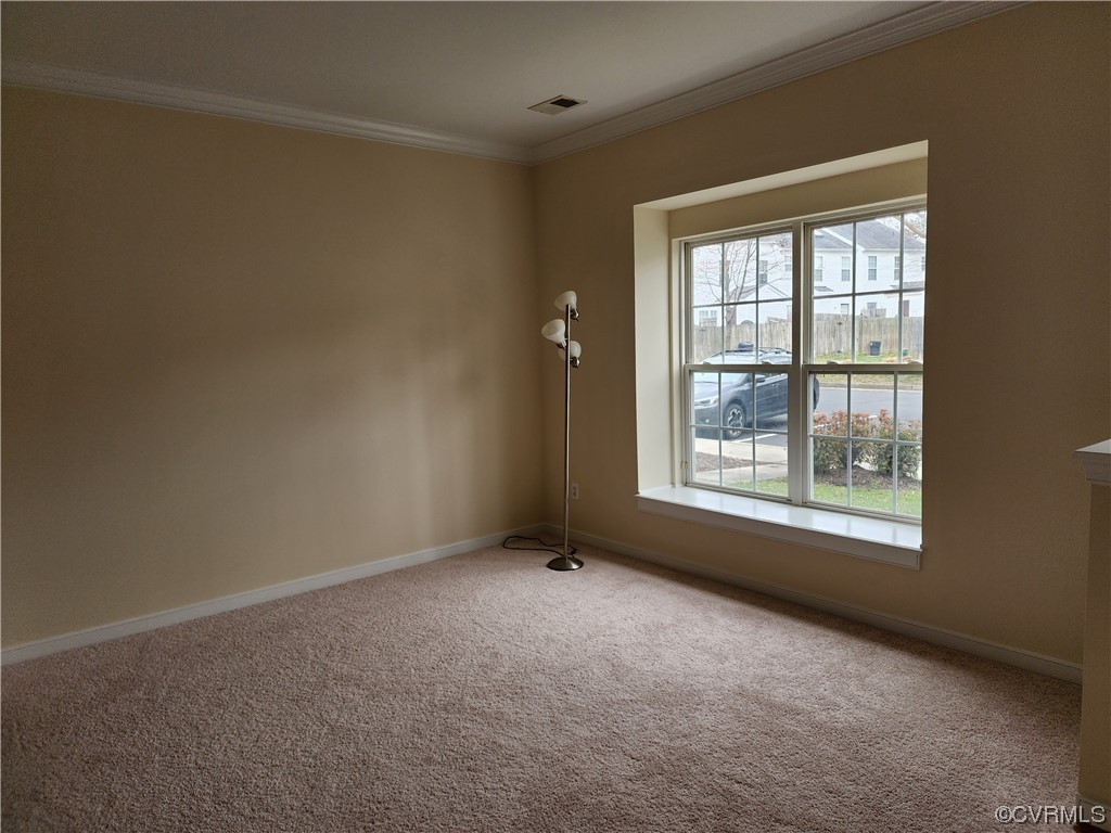 8657 Millstream Drive Henrico, VA 23228 - Photo 4 of 19 a view of an empty room with a window